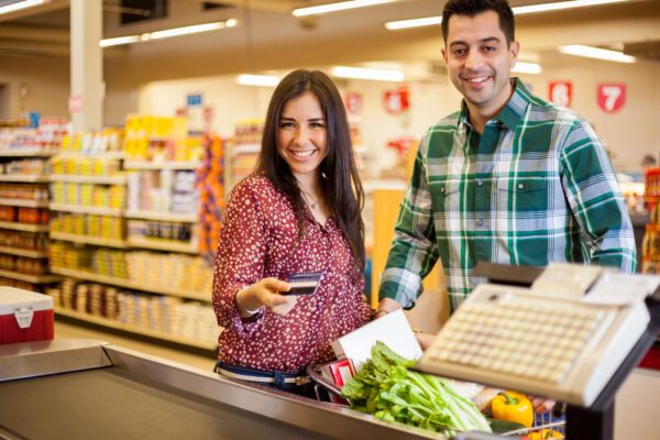 A couple grocery shopping